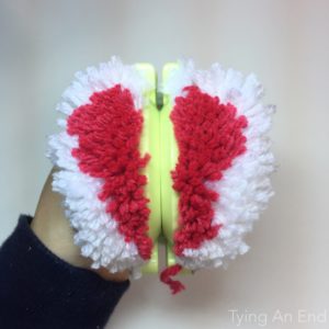 Heart pom pom by Tying An End - fully cut