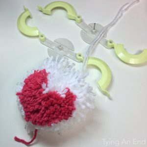 Heart pom pom by Tying An End - step 8