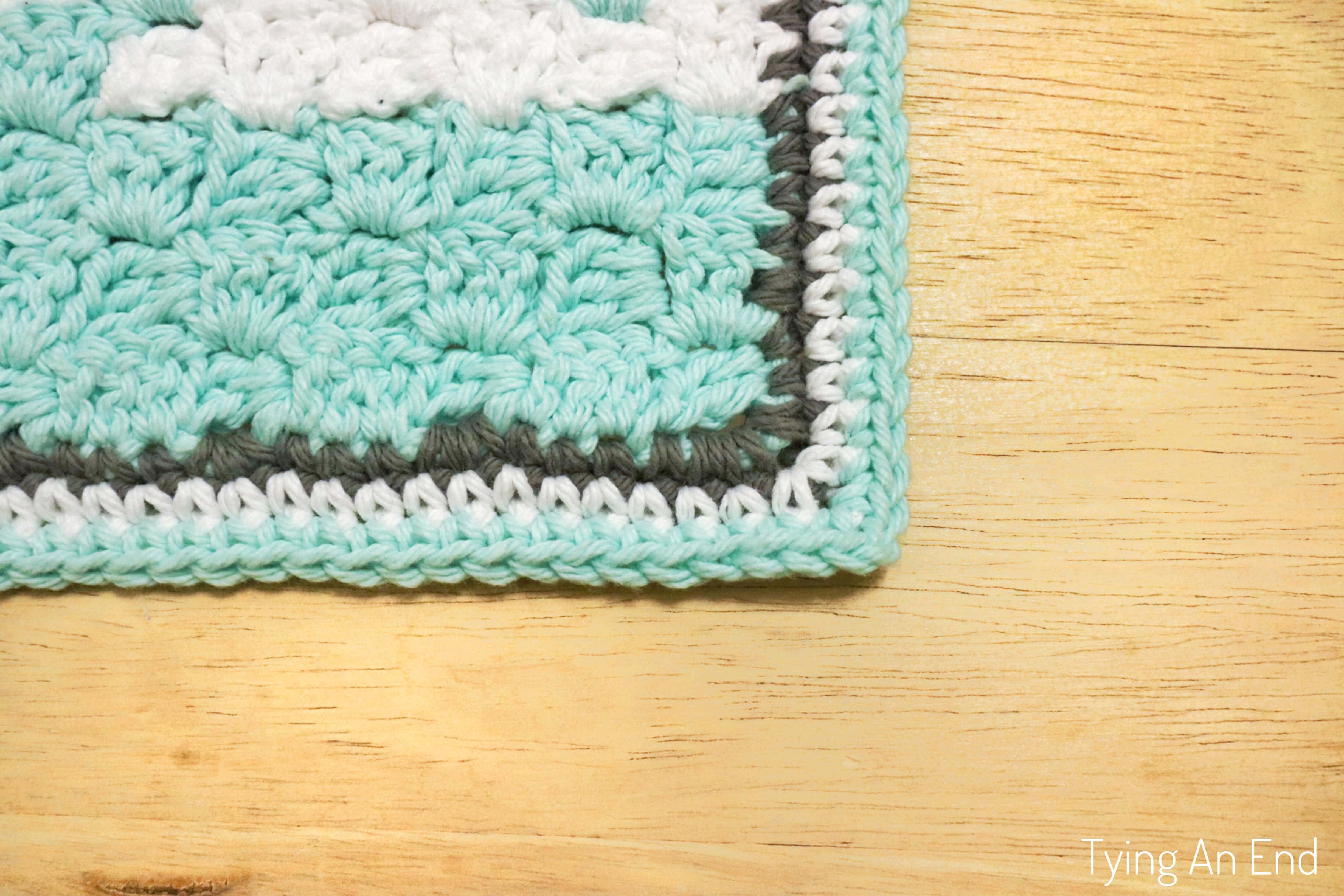 Hello Winter Bath Mat C2C free crochet pattern -Tying An End