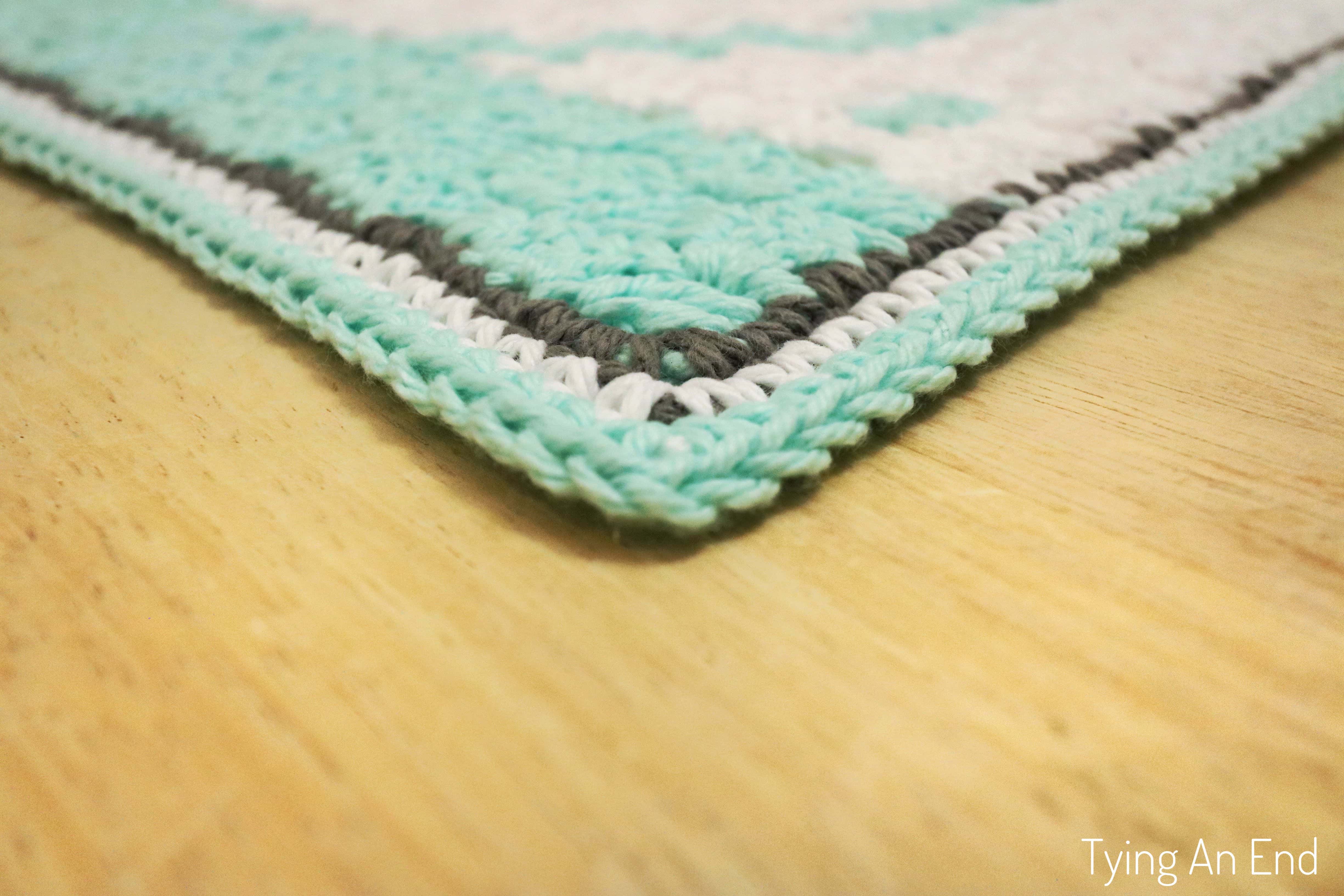 Hello Winter Bath Mat C2C free crochet pattern -Tying An End