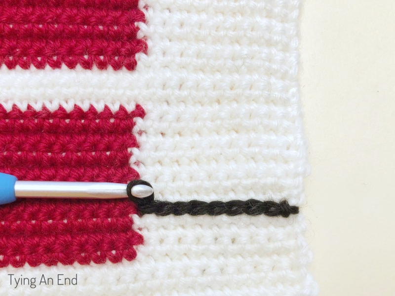 crochet plaid pattern design using surface slip stitch with red gift box pattern