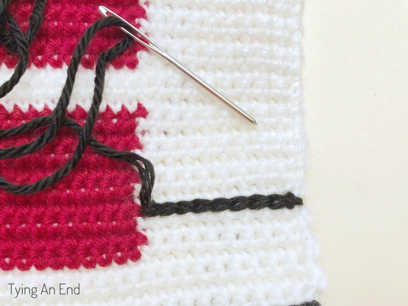 crochet plaid pattern design using surface slip stitch with red gift box pattern