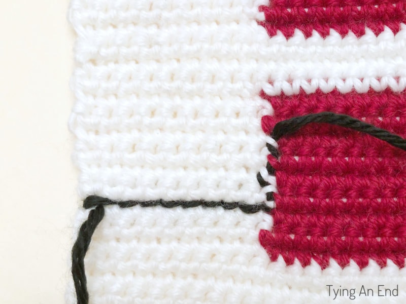 crochet plaid pattern design using surface slip stitch with red gift box pattern