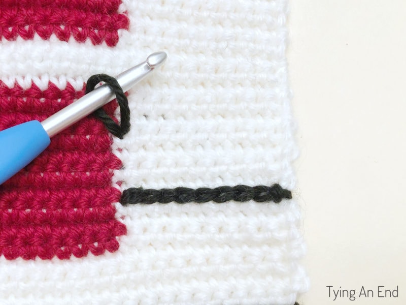 crochet plaid pattern design using surface slip stitch with red gift box pattern