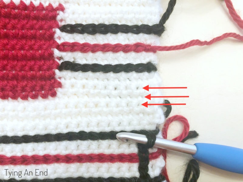 crochet plaid pattern design using surface slip stitch with red gift box pattern