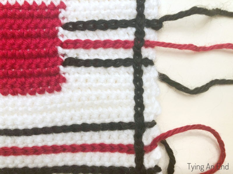 crochet plaid pattern design using surface slip stitch with red gift box pattern