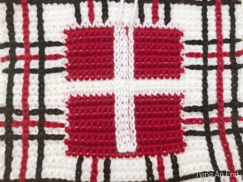 crochet plaid pattern design using surface slip stitch with red gift box pattern